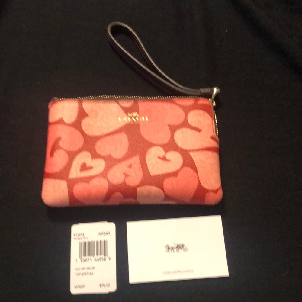 AUTH Coach wristlet w/hearts